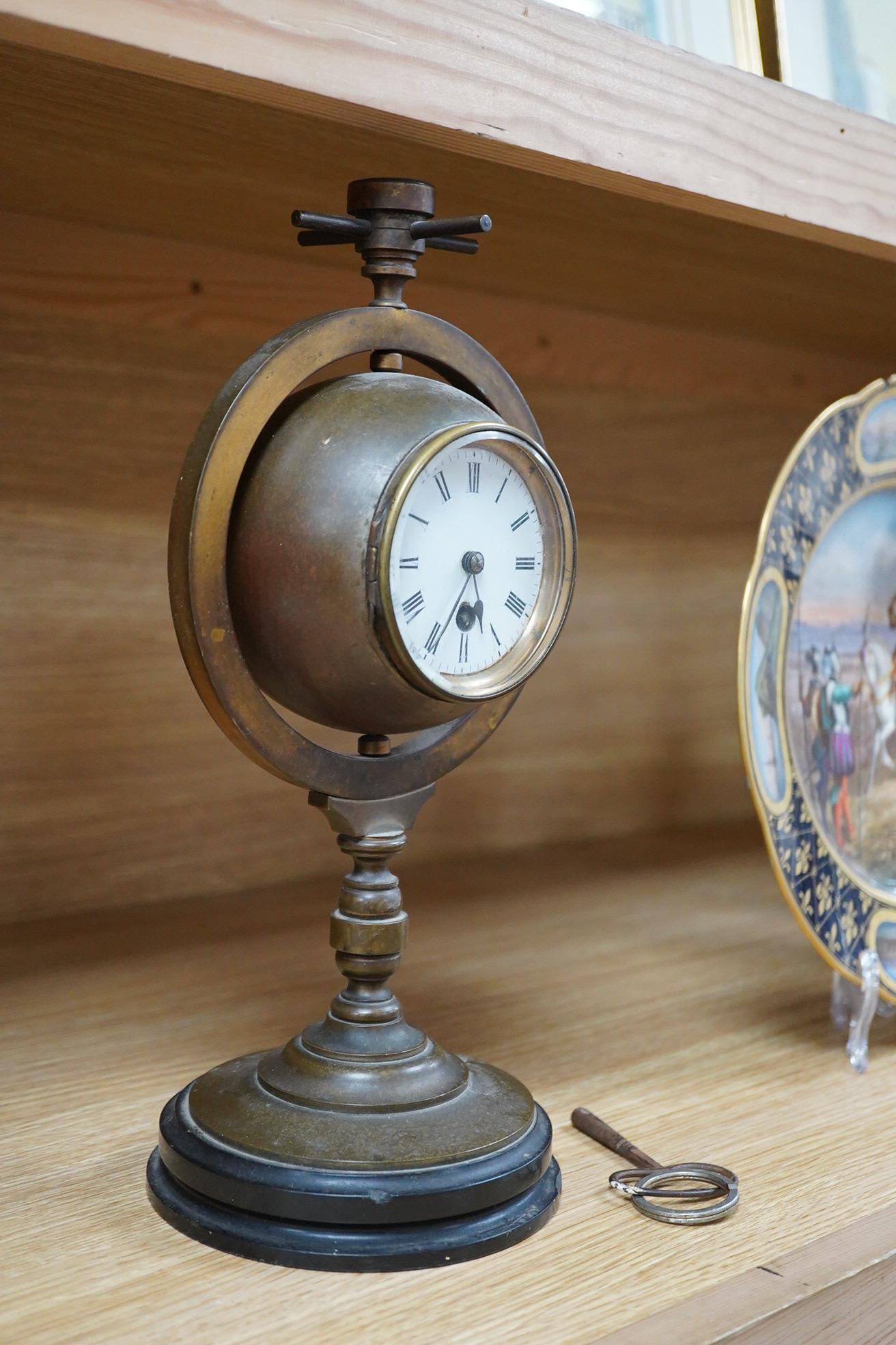 A late 19th century nautical theme brass timepiece barometer, surmounted by a compass, 30cm high